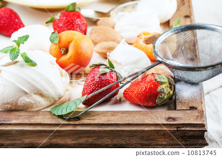 Meringue with apricot and strawberry 10813745