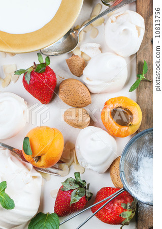 Meringue with apricot and strawberry 10813756
