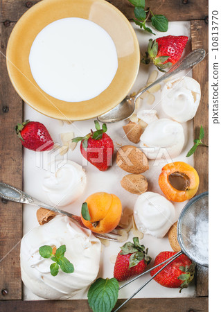 Meringue with apricot and strawberry 10813770