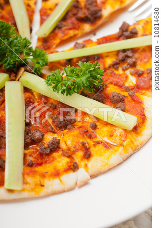 Turkish beef pizza with cucumber on top Turkish beef pizza with cucumber on top 10814680