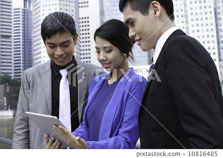 Asian working professionals outdoor 10816485