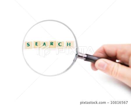 Magnifying glass in hand on the word search. On a white background. 10816567