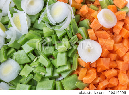 Vegetables peas and carrots Slicing for salad and soup. Close-up. Vegetables peas and carrots Slicing for salad and soup. Close-up. 10816606