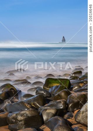 Sea stones in the foreground in the landscape of the sea. Portugal, Aljezur. Sea stones in the foreground in the landscape of the sea. Portugal, Aljezur. 10816646