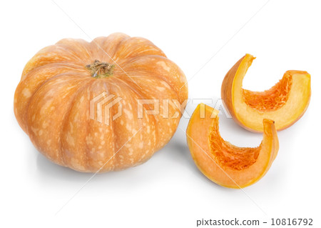 Cut pieces of pumpkin soup slices. On a white background. 10816792