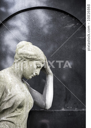 sad sculpture leaning here head on one hand 10816868