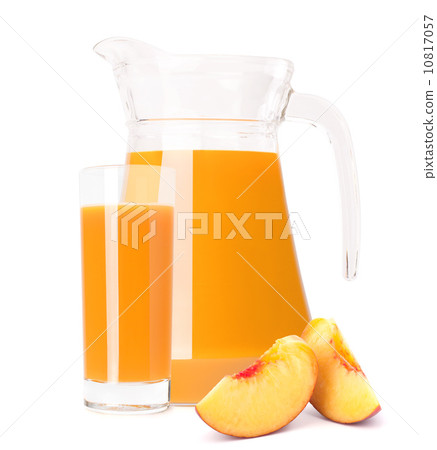 Peach fruit juice in glass jug Peach fruit juice in glass jug 10817057
