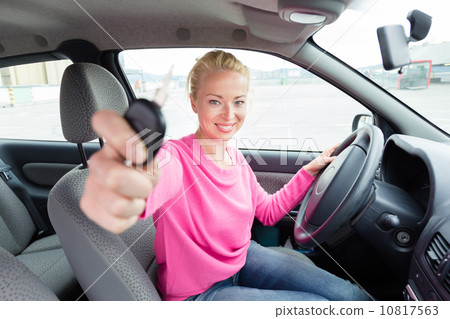 Woman driver showing car keys. 10817563