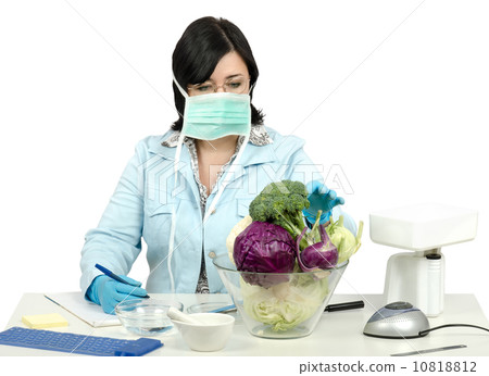 Expert choosing a broccoli for inspection Expert choosing a broccoli for inspection 10818812