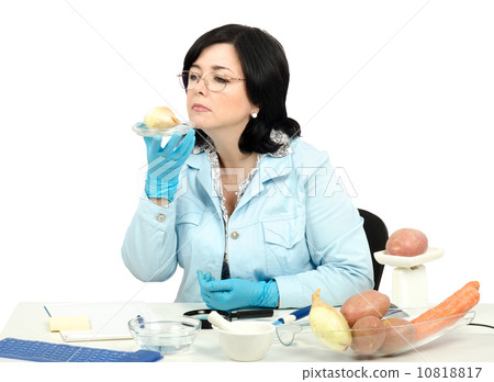 Expert smelling onion in laboratory 10818817