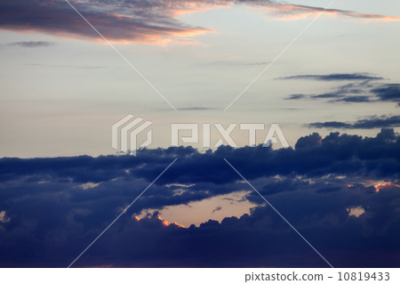Sky with dark clouds at sunset 10819433