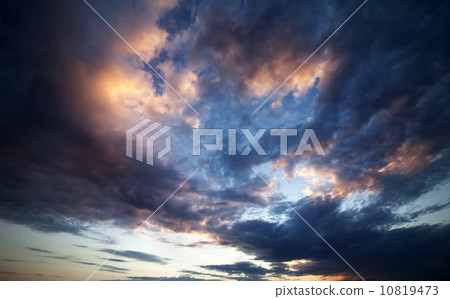 Dark clouds at sunset. Wide angle view. 10819473