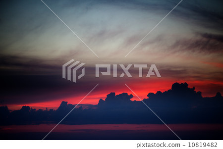 Dark sunrise sky on lake 10819482