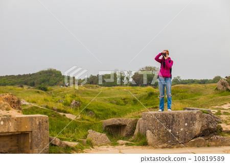 Old broken German bunkers of Atlantic Wall on Pointe-Du-Hoc. Wes Old broken German bunkers of Atlantic Wall on Pointe-Du-Hoc. Wes 10819589