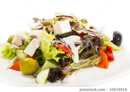 Greek salad on a white background in the restaurant 10819918