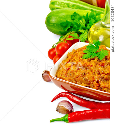 Caviar from squash in clay bowl with oil 10820484