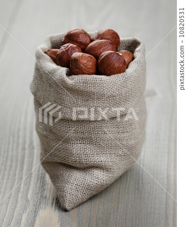 sack bag full of hazelnut kernels sack bag full of hazelnut kernels 10820531
