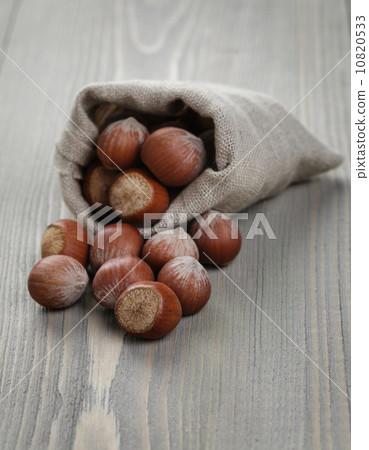 organic hazelnuts poured out of the pouch organic hazelnuts poured out of the pouch 10820533