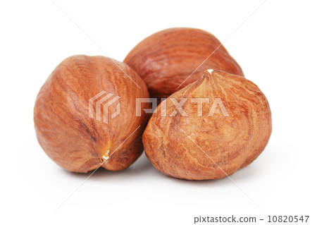 three hazelnut kernels three hazelnut kernels 10820547