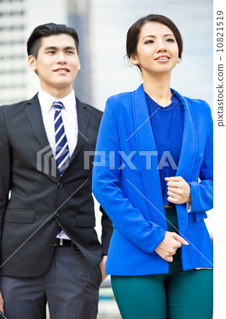 Two business executives looking ahead Two business executives looking ahead 10821519
