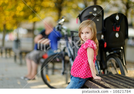 Adorable little girl portrait outdoors 10821784