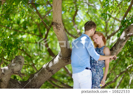 Young couple on a tropical island 10822533