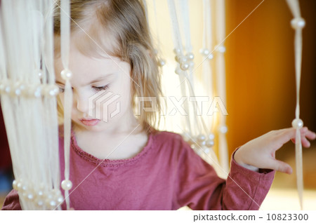 Adorable little girl portrait indoors 10823300