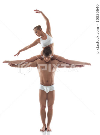 Image of attractive acrobats posing in studio Image of attractive acrobats posing in studio 10826640