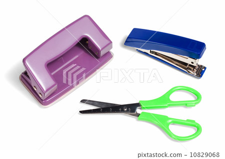 Office stationery, stapler, puncher and scissors isolated on whi 10829068