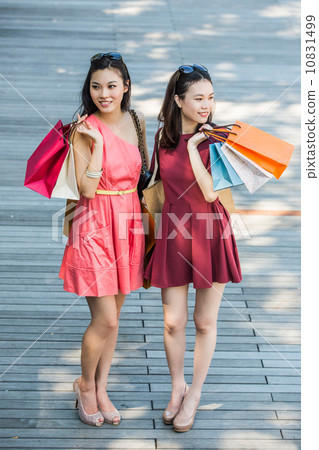 Young asian female shoppers Young asian female shoppers 10831499