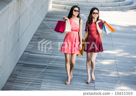 Young asian female shoppers Young asian female shoppers 10831503