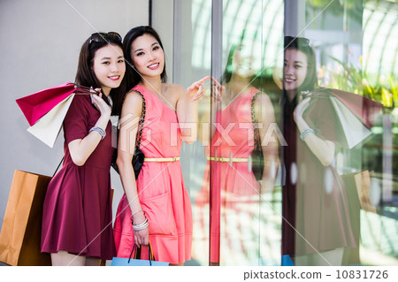 Young asian female shoppers 10831726