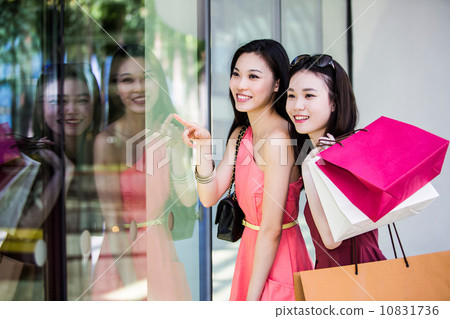 Young asian female shoppers 10831736
