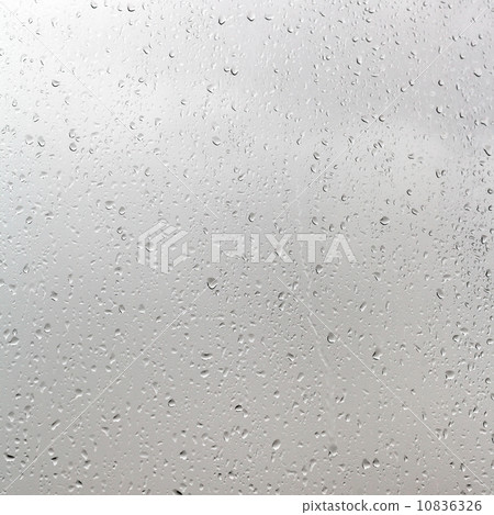 rain drops on window pane in cloudy day rain drops on window pane in cloudy day 10836326