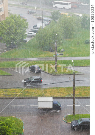 above view of urban street in heavy rain above view of urban street in heavy rain 10836334