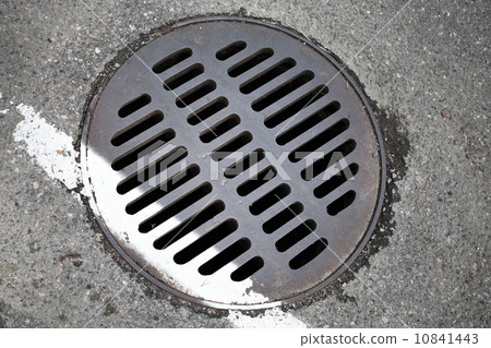 Round hatch and white dividing line on urban asphalt road Round hatch and white dividing line on urban asphalt road 10841443