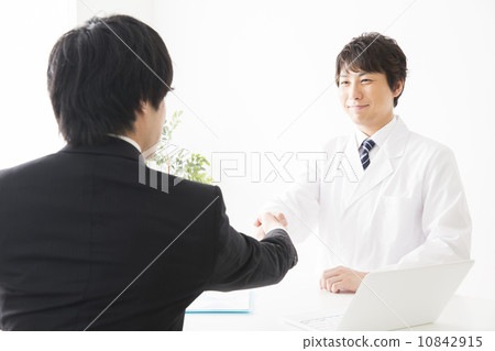 Male of white coat and man of suit 10842915