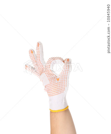 Thin work glove showing a ok sign. Thin work glove showing a ok sign. 10845940