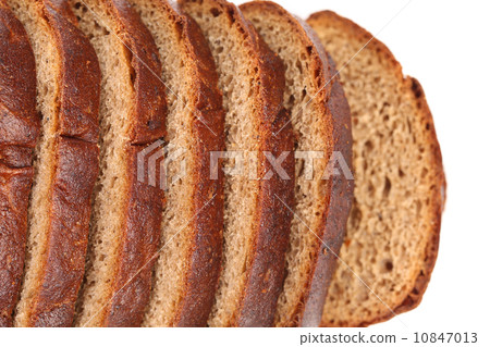 Slices of brown bread. 10847013
