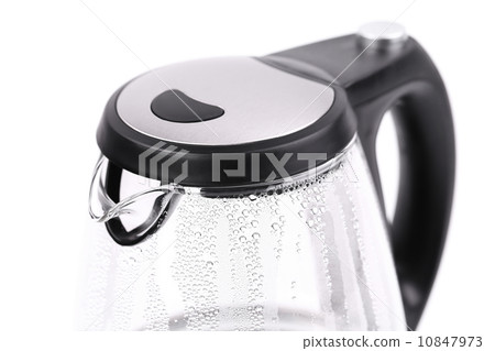 Water boiling in the glass electric kettle. Water boiling in the glass electric kettle. 10847973