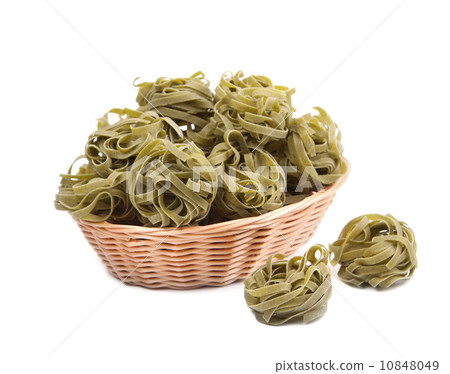 Italian pasta tagliatelle in basket. 10848049