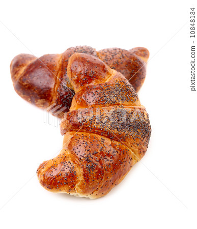 Appetizing croissants with poppy. 10848184