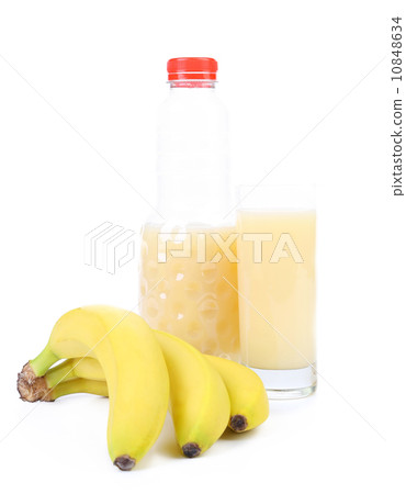 Glass and bottle of juice. Bananas. Glass and bottle of juice. Bananas. 10848634