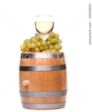 barrel, ripe grapes and glass of wine 10848881
