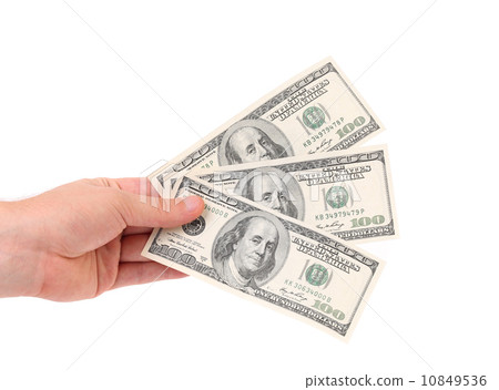 Male hand holding american Dollar-bills. 10849536