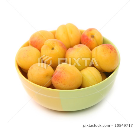 Apricots in a deep plate 10849717
