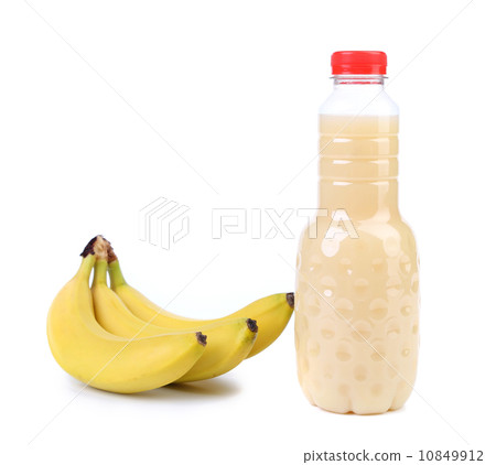 Banana and bottle of juice. Banana and bottle of juice. 10849912