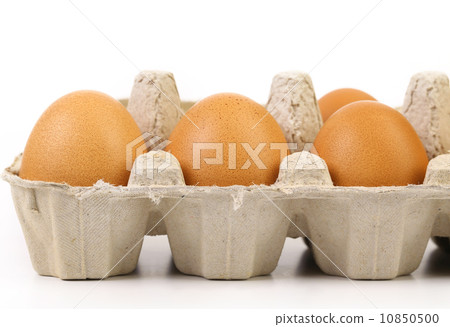 Four brown eggs in egg box Four brown eggs in egg box 10850500