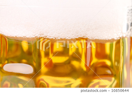 Closeup of mug with beer foam. Closeup of mug with beer foam. 10850644