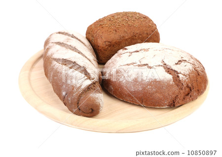 Various healthy bread on a wooden tray. 10850897